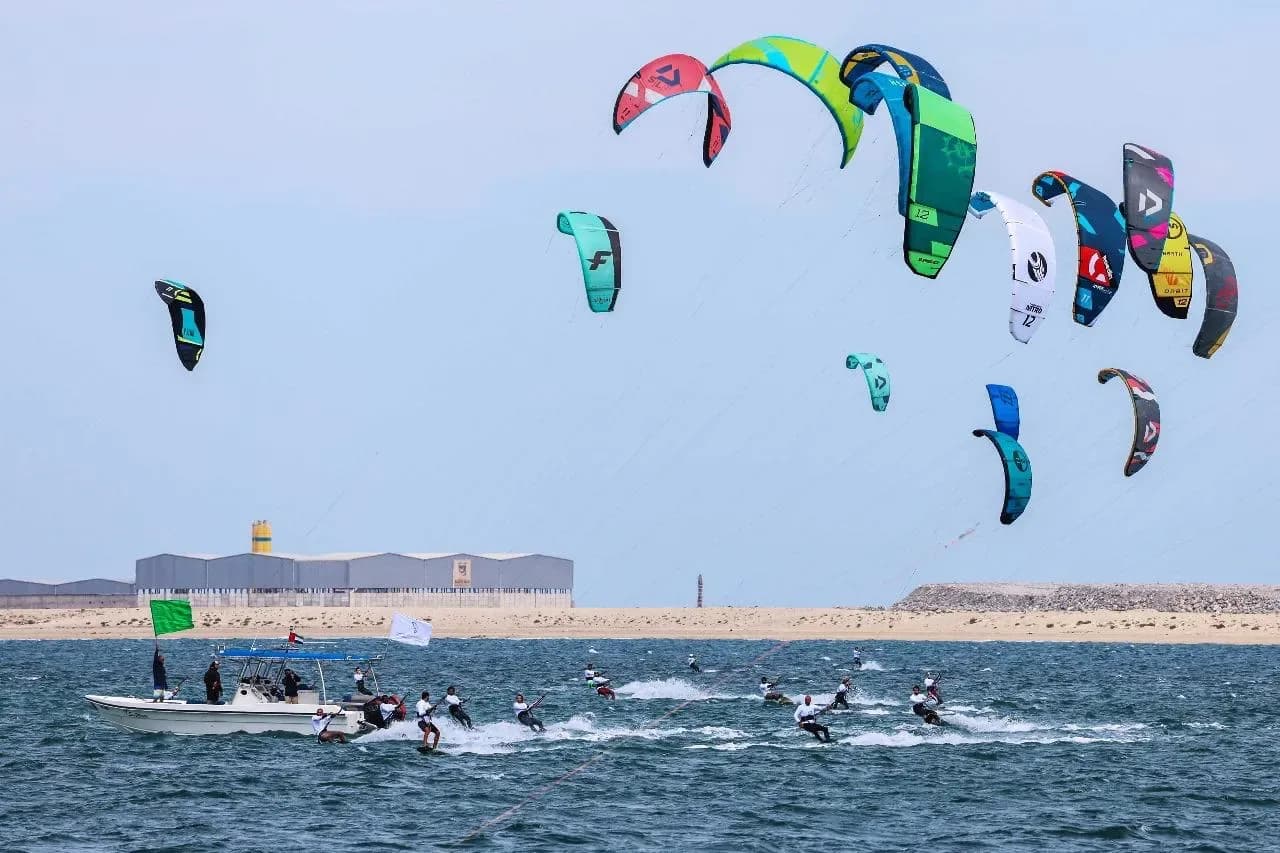 Kite racing off the beach