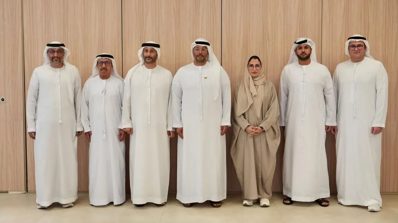 Officials standing together for a group photograph at a federation event